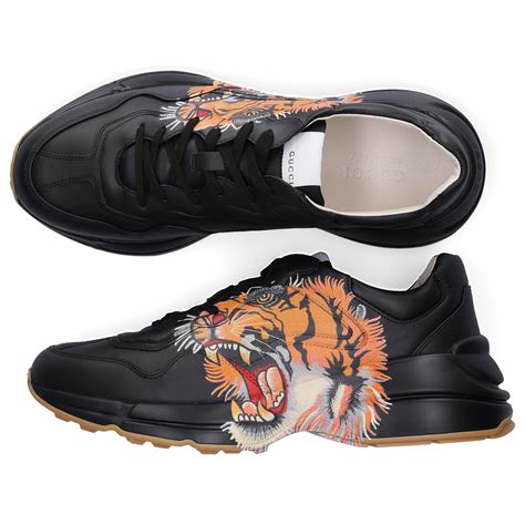 gucci black sneakers tiger|Gucci rhyton leather sneakers.